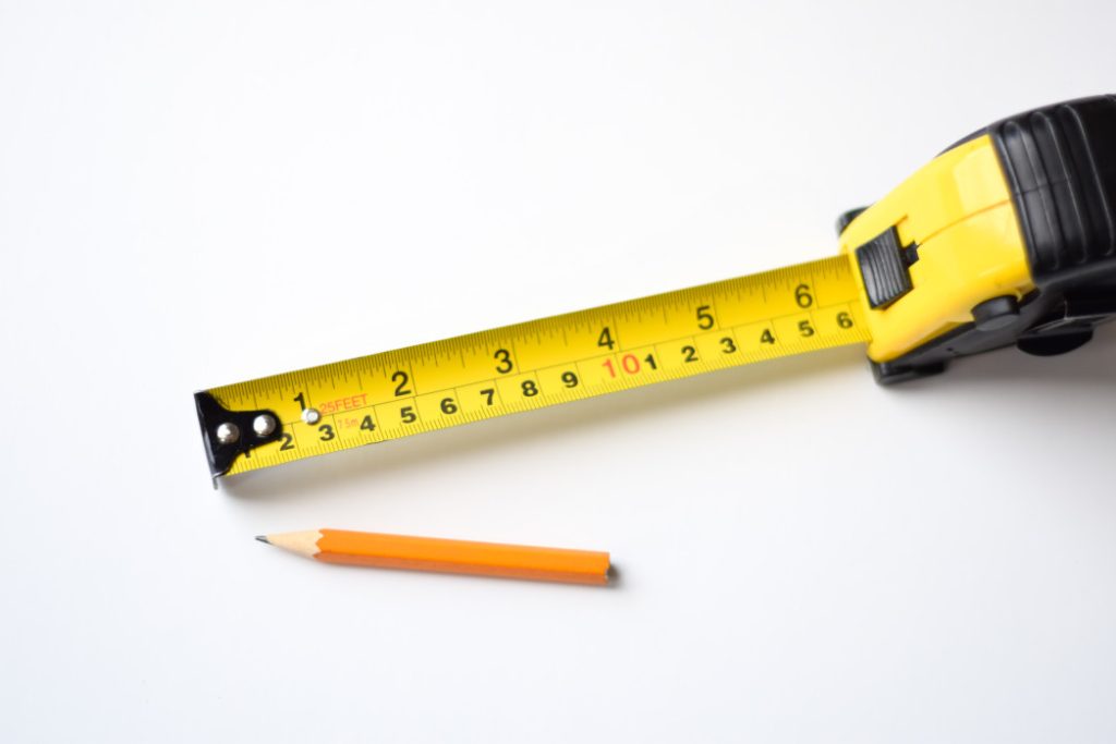Tape Measure and Pencil, used for tiling leveling tile