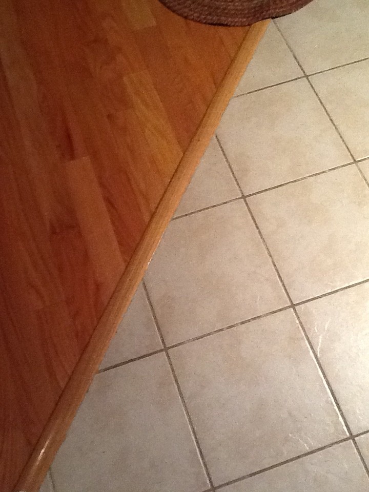 The diagonal cut tile to wood transition idea