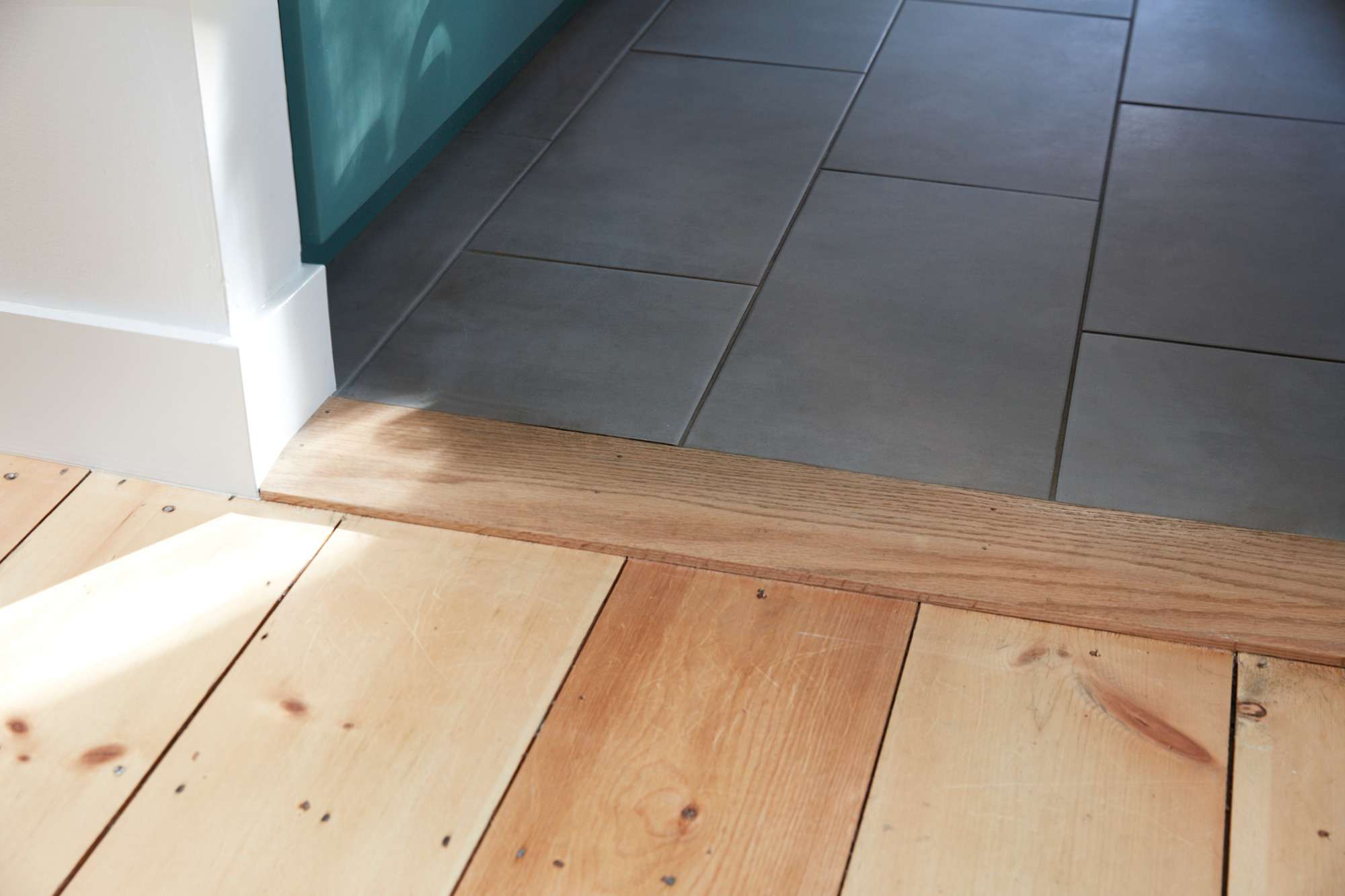 The Elevated tile to wood floor  Transition