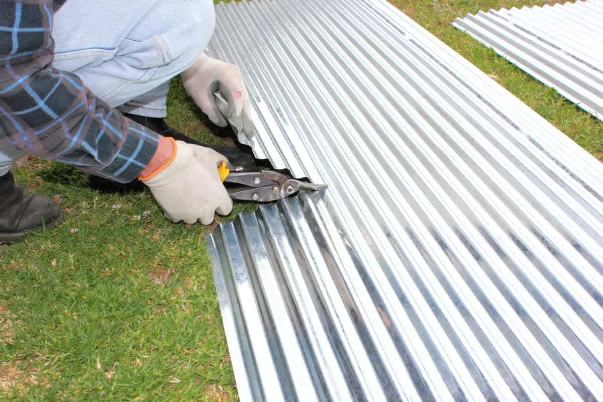 use tin snips to cut metal roofing