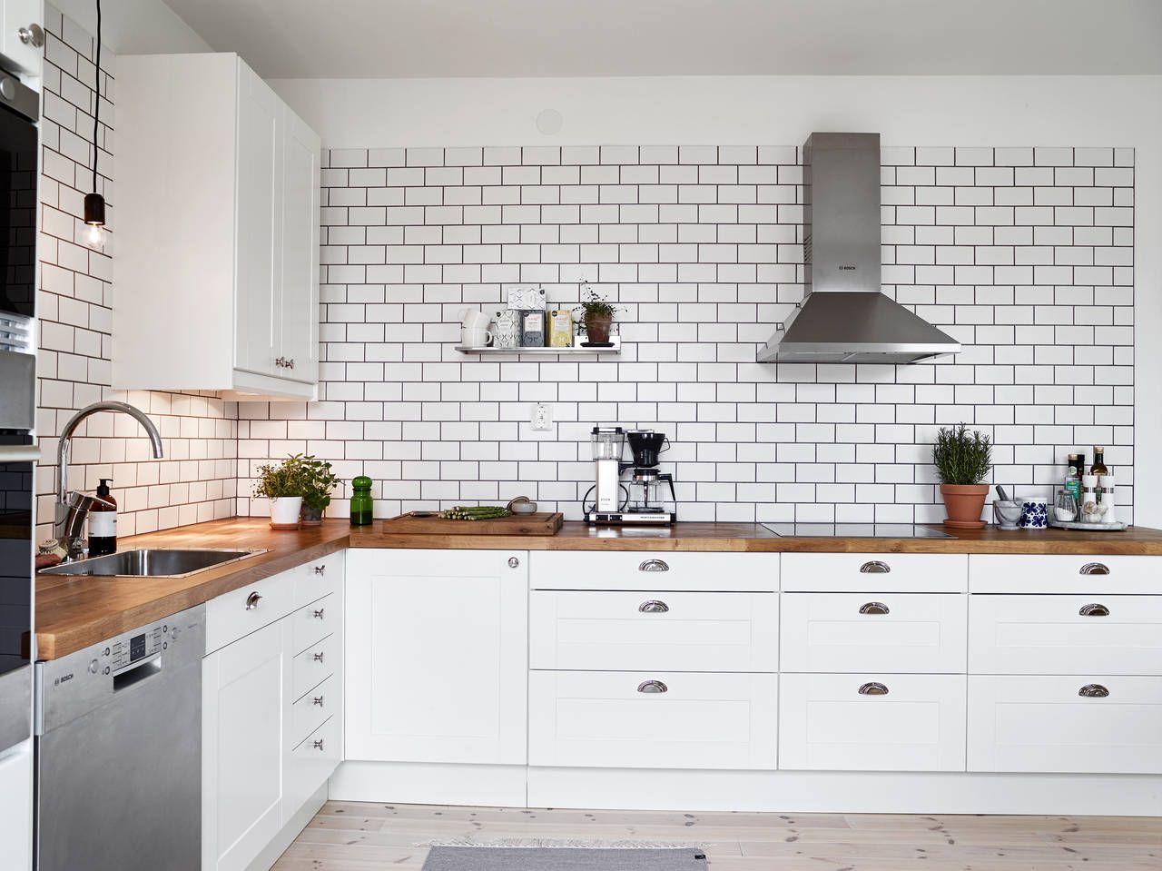 White Subway Tile Backsplash with Black Grout