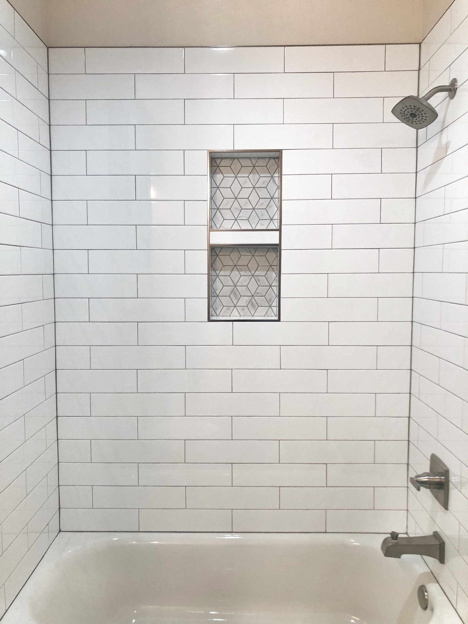 White Subway Tile Backsplash with Gray Grout