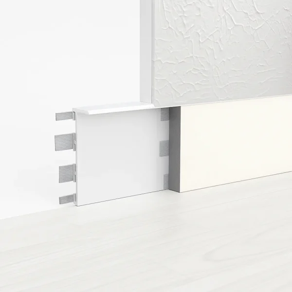 Integrated-Fin Shadow Gap Skirting Trim System